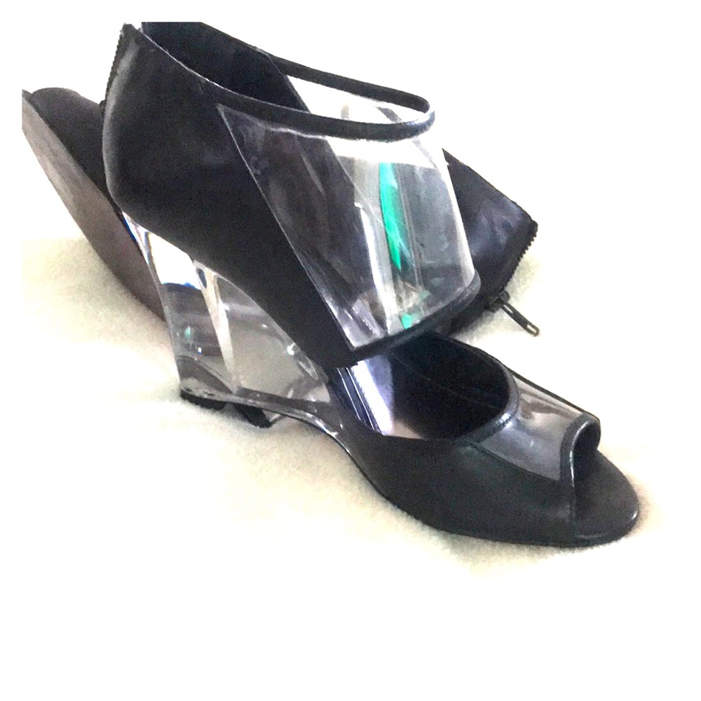 Glass heel to toe, black designer shoes from Aldo